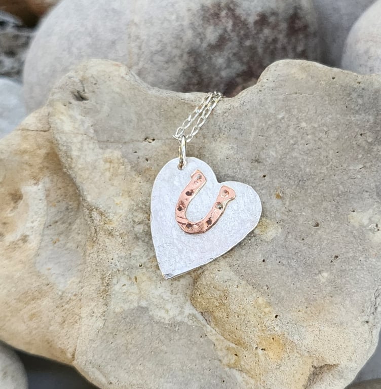 Heart and horseshoe pendant in sterling silver and copper