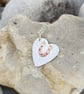 Heart and horseshoe pendant in sterling silver and copper