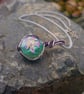Purple Lilly in Grass Spherical Pendant Necklace