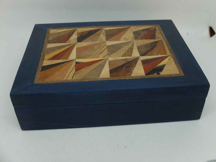 Renovated old box, veneered in blue with parquetry design to lid