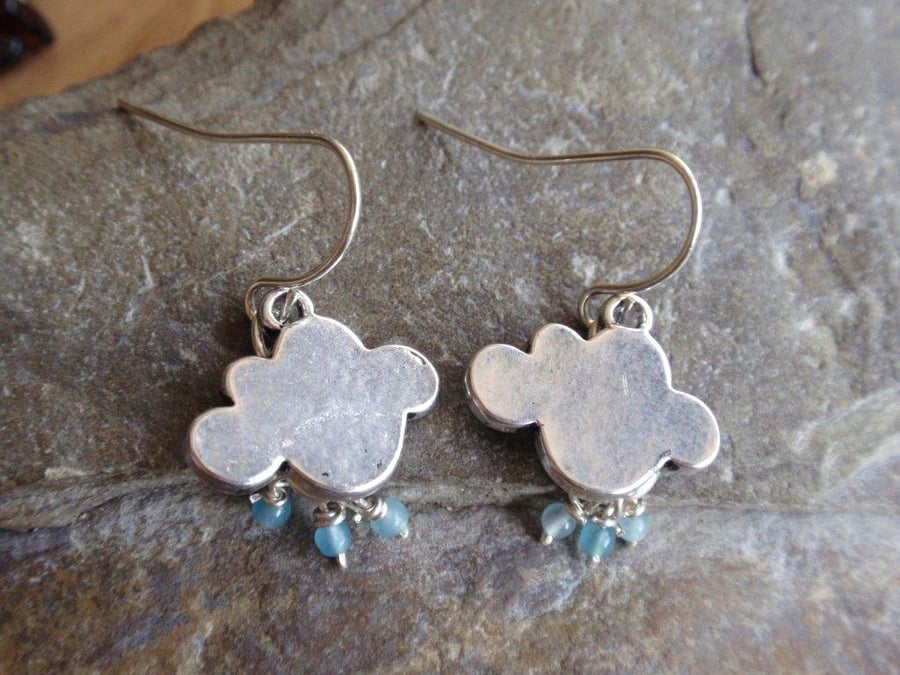rain cloud earrings with tiny blue aquamarine raindrops. Weather the storm.
