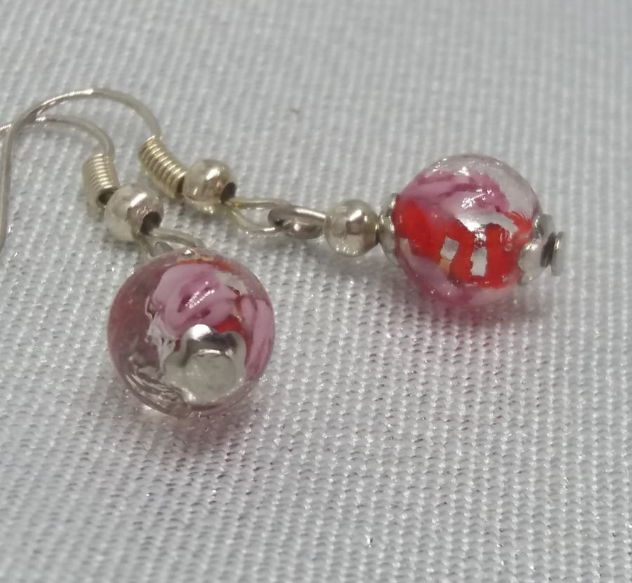 ER89 Red glass bead drops with inner flower pattern