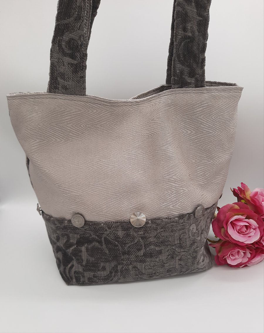 Silver and Ash grey chenille handbag with decorative buttons. 