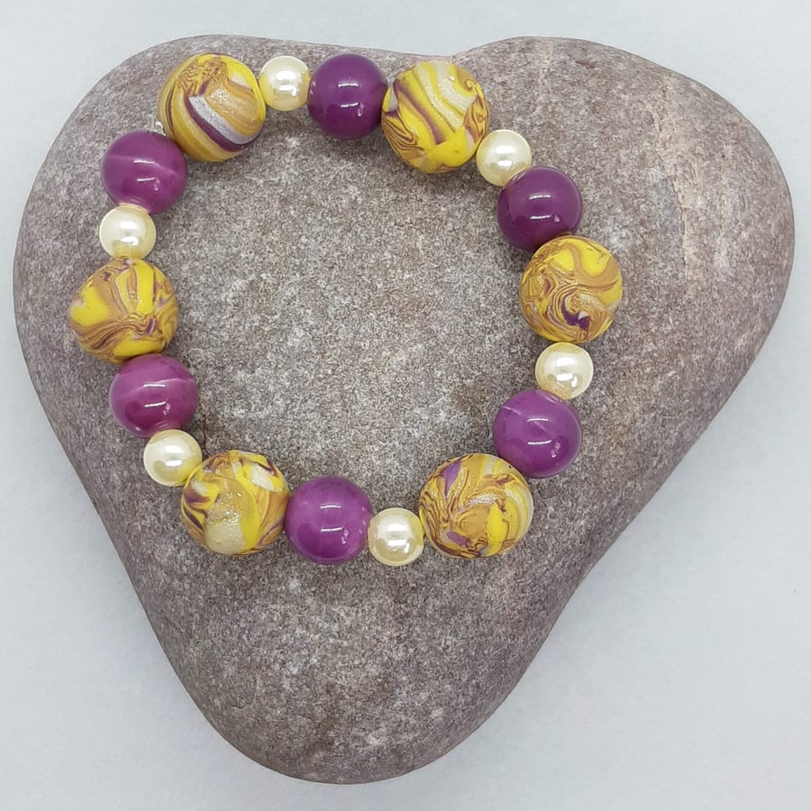 Pretty purple and yellow polymer clay bracelet