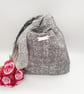 Reversible grey and patterned knot bag.  - Image 5