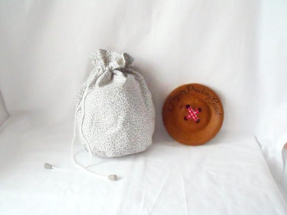 grey floral drawstring make up pouch or small project bag 