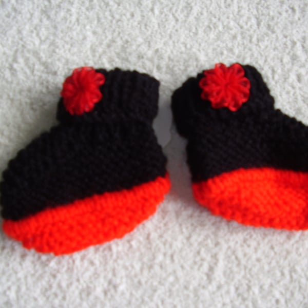 Bootees hand knitted in red and black