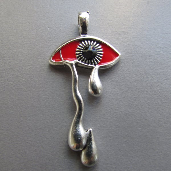 Silver and Red Bleeding Eye Tibetan Jewellery Charm