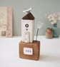 Tall Wooden Sea Hut with Clay Flower and Seagull 'Sea'
