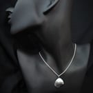 Sterling silver seashell with silver pearl