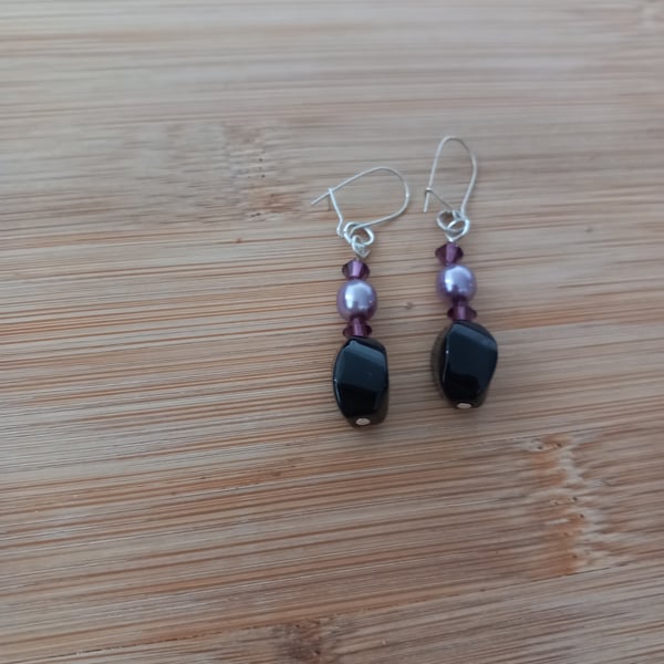 Black and purple beaded pearl drop earrings, pierced ears