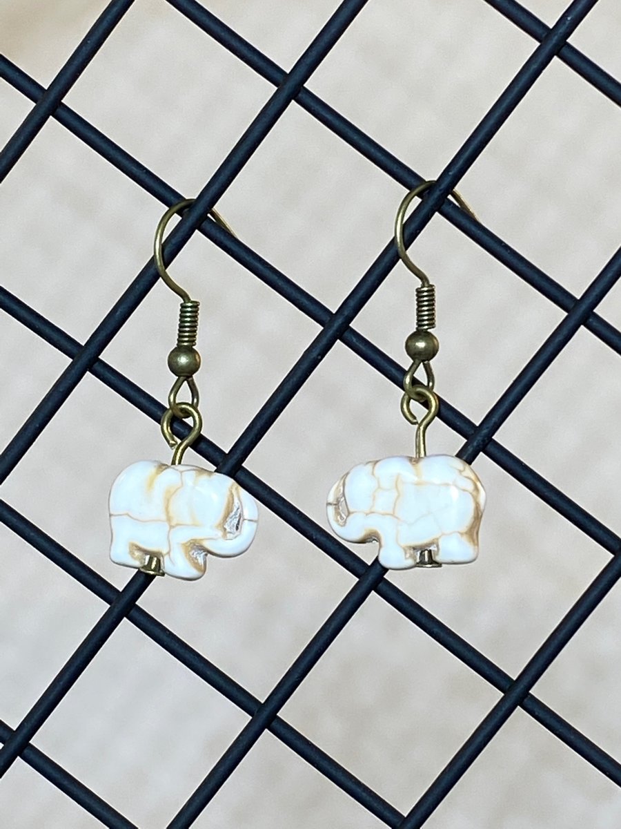 White elephant earrings 