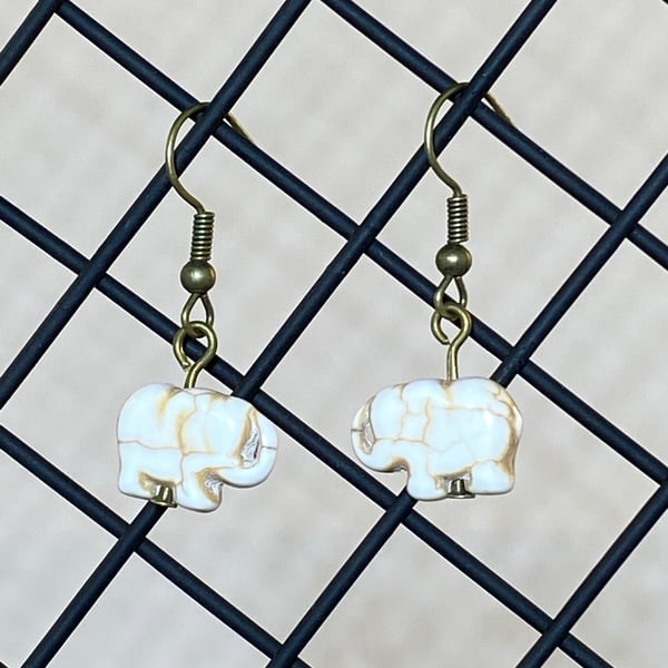 White elephant earrings 
