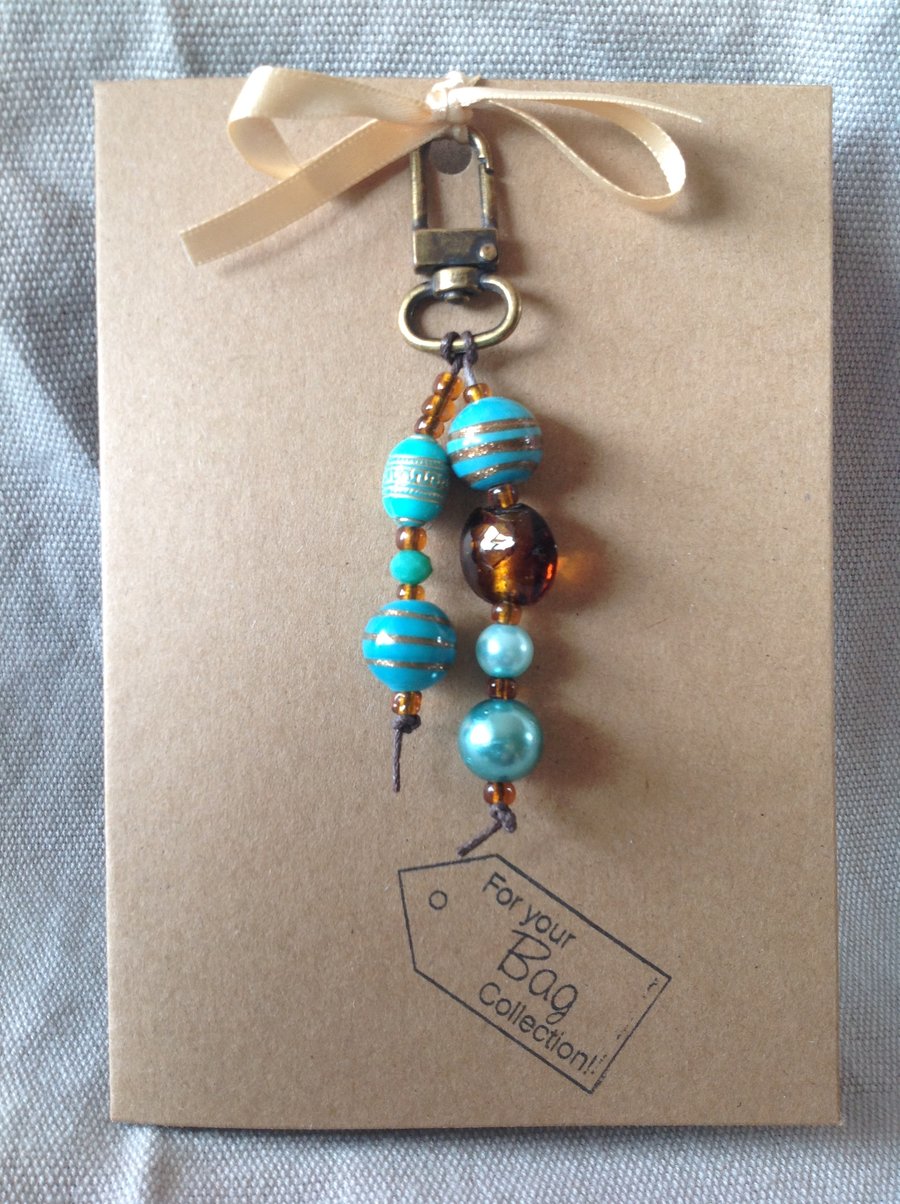 A6 kraft card with bag charm attached