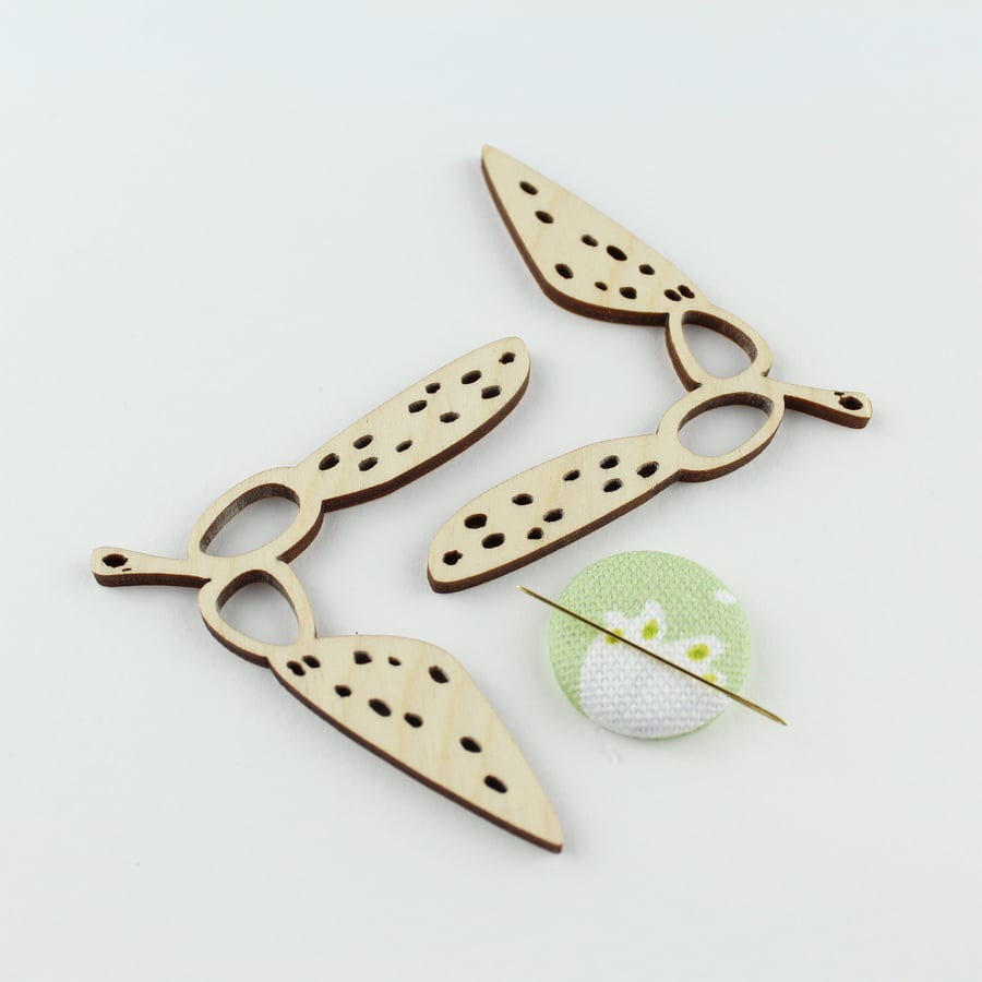 two sycamore seed thread holder set