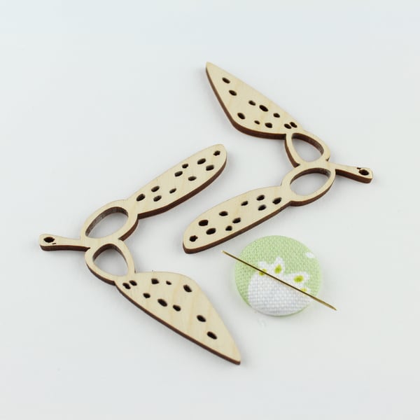 two sycamore seed thread holder set