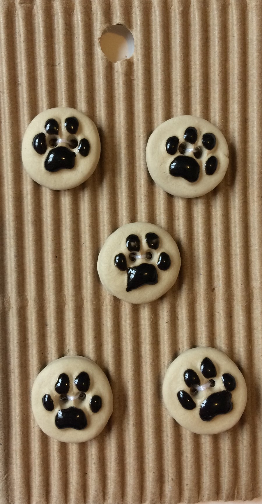 Set of 5 ceramic dog paw print buttons