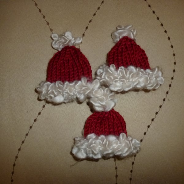 christmas3 Hand knitted christmas hat decorations - traditional red cream  white