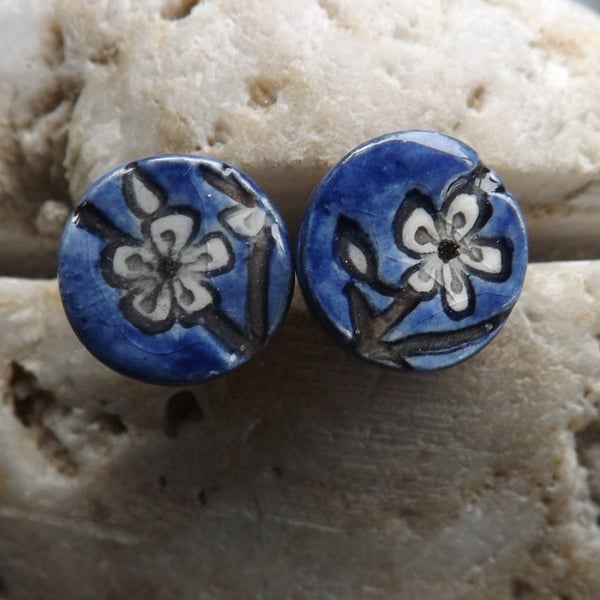 Handmade Ceramic and sterling silver Blackthorn round stud earrings in blue