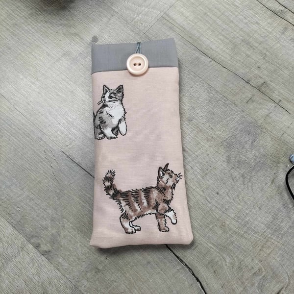 Glasses case with cats on pink background