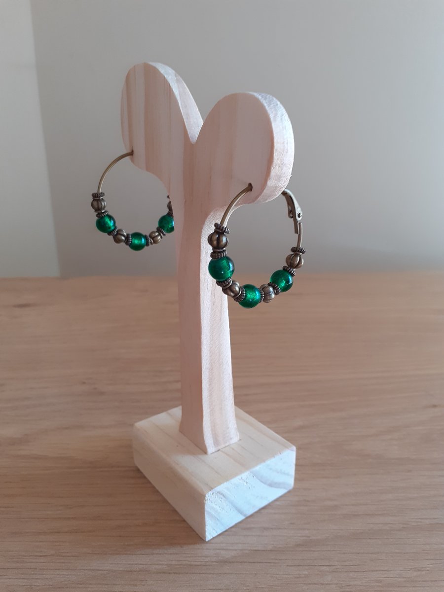 ANTIQUE BRONZE AND EMERALD GREEN HOOP EARRINGS.