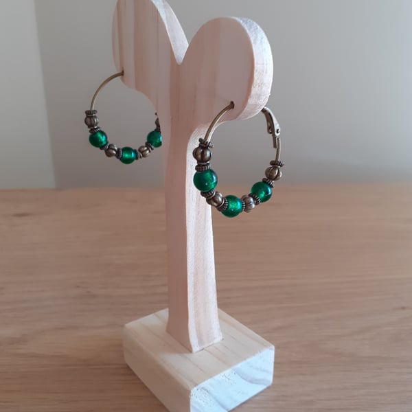 ANTIQUE BRONZE AND EMERALD GREEN HOOP EARRINGS.