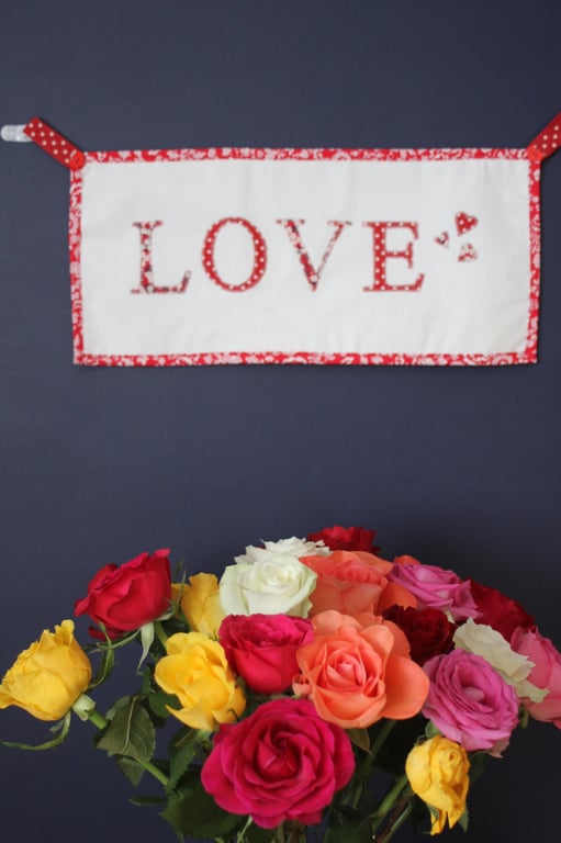 Floral 'Love' fabric banner