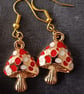 Red, white and gold toadstool charm dangle earrings  - Image 1