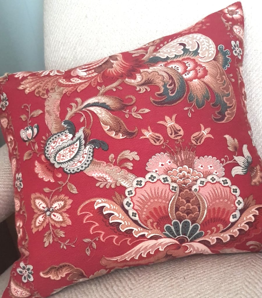 Vintage red fabric cushion