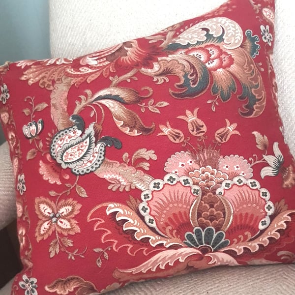 Vintage red fabric cushion