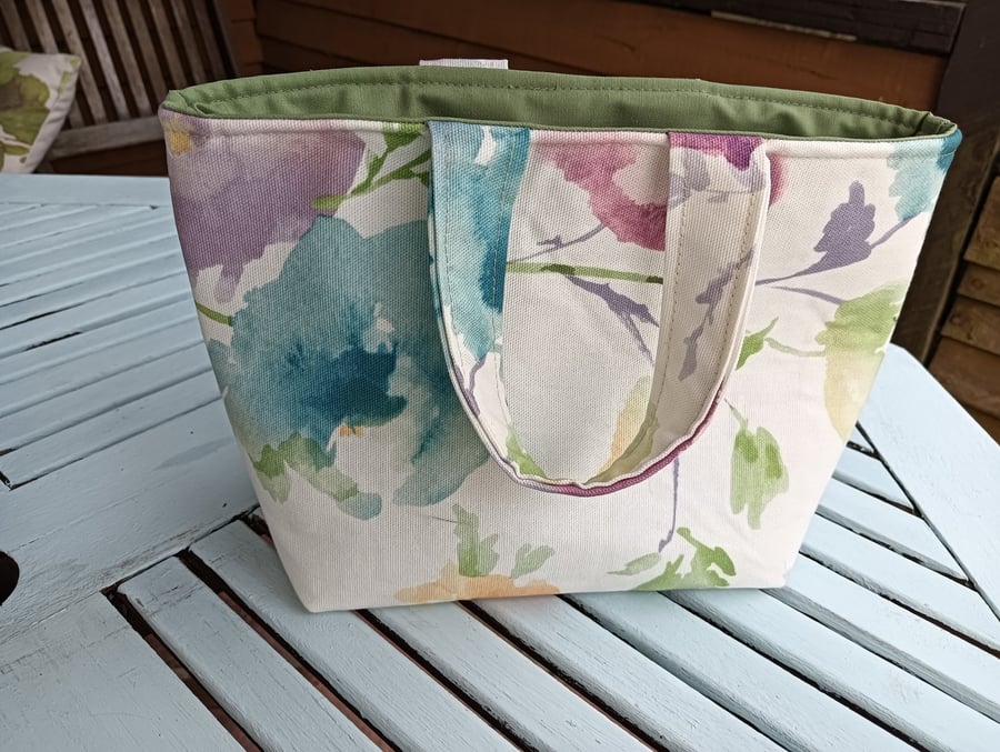 Small floral, lined tote bag.