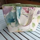 Small floral, lined tote bag.