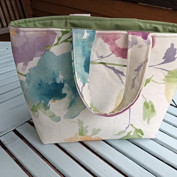 Small floral, lined tote bag.