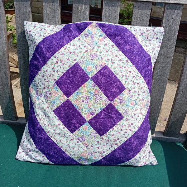 Purple patchwork cushion cover. Mauve floral and deep purple. 37cm sq.