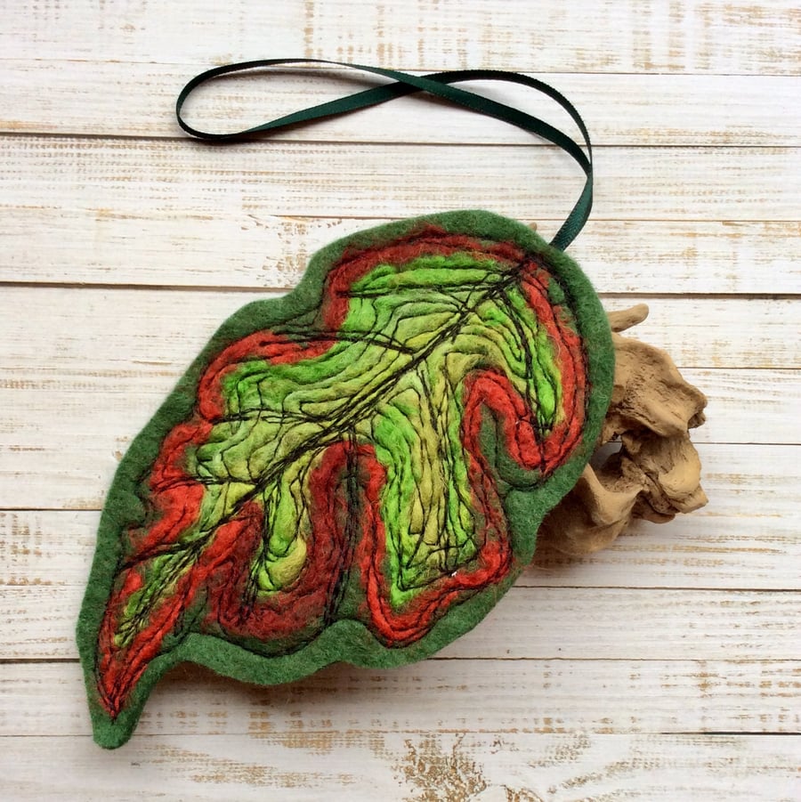 Felt handmade embroidered leaf decoration. 