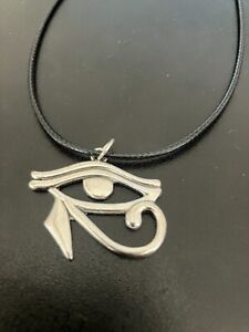 eye of horus eye of ra charm pendant on a 18" leather cord necklace