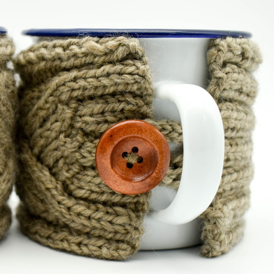 SOLD - Pair of hand knitted mug cosies in beige