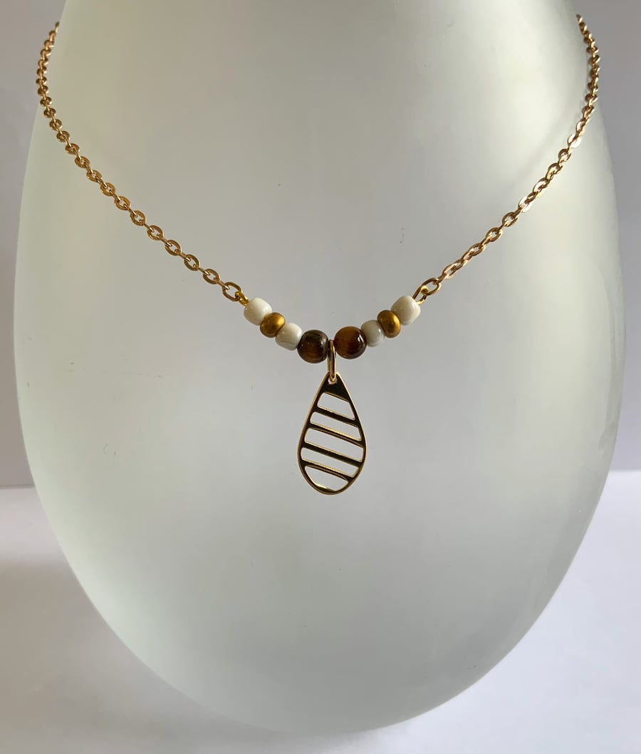 Gold Steel Pendant Charm Necklace.