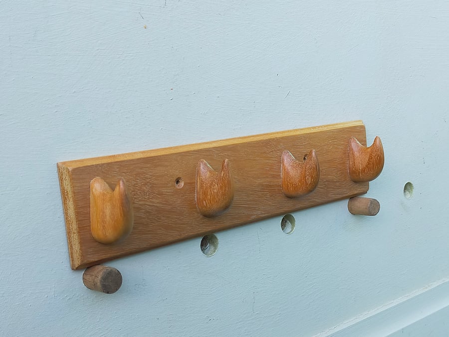 Four Slim Mahogany Claws