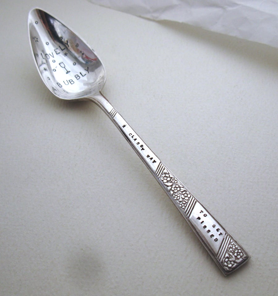 Lovely Bubbly fizz saver spoon, slightly rude wording