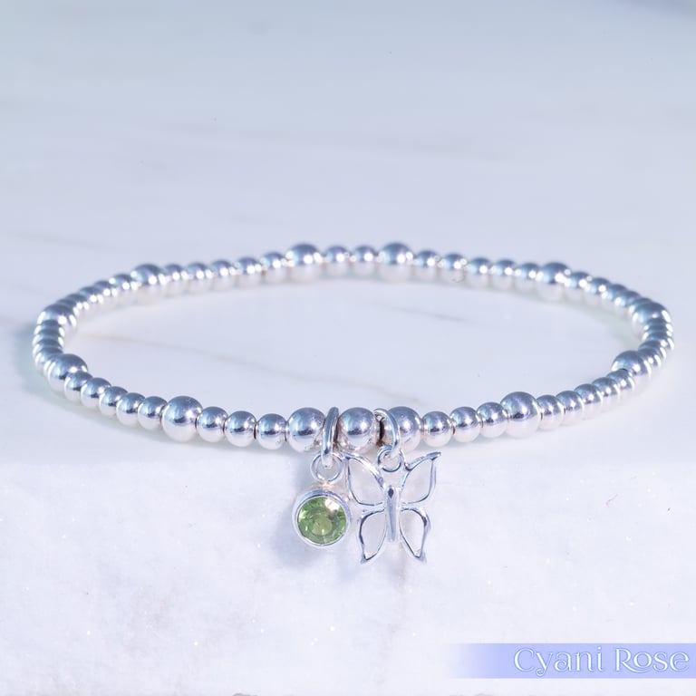 Butterfly Charm Bracelet Sterling Silver Stretchy green glass handmade 