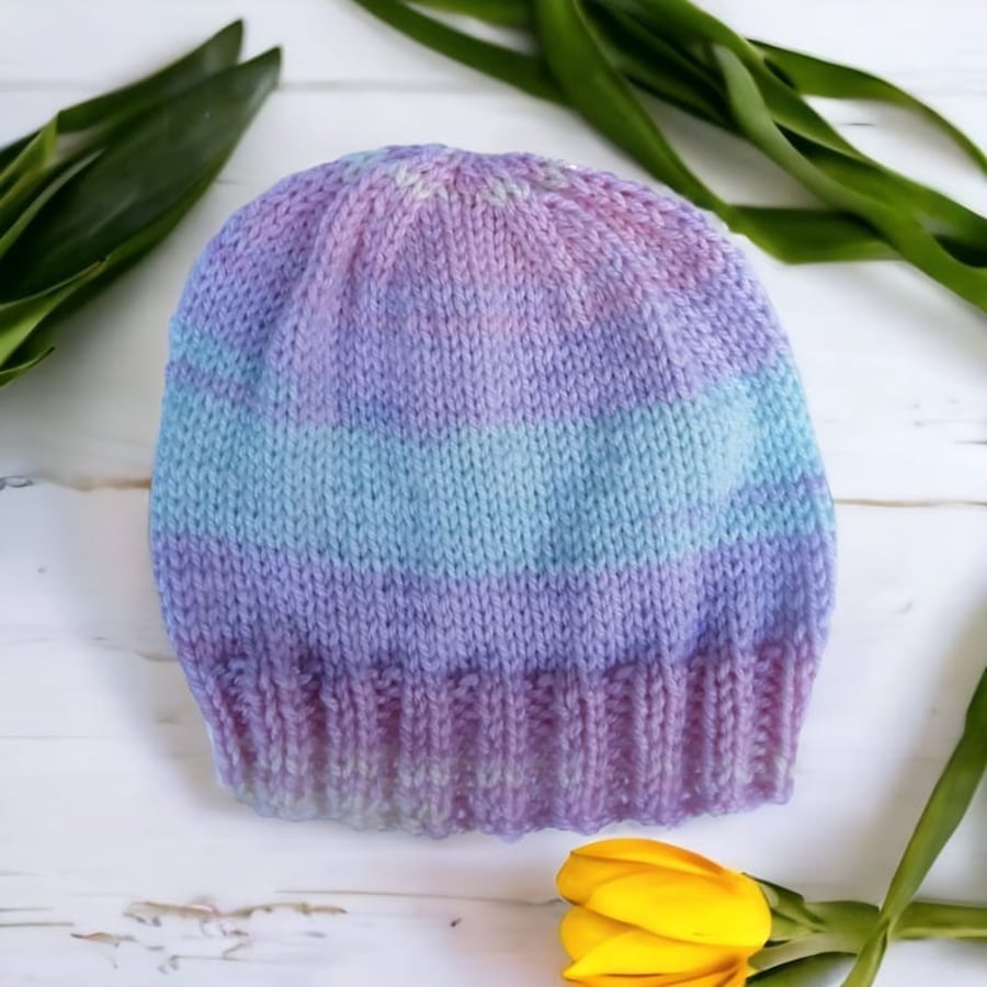 Hand knitted baby hat in pastel stripes 0 - 3 months