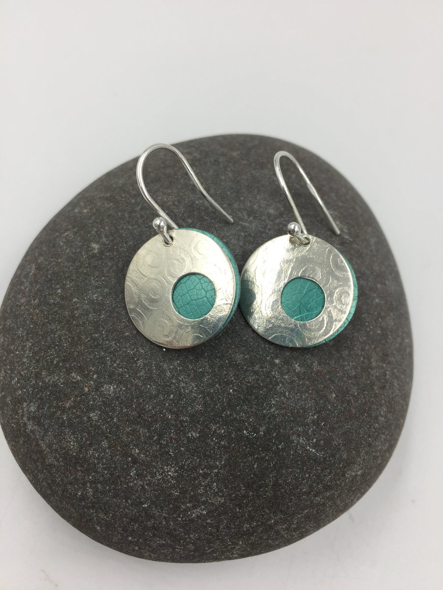 Spiral textured silver and teal aluminium circle earrings