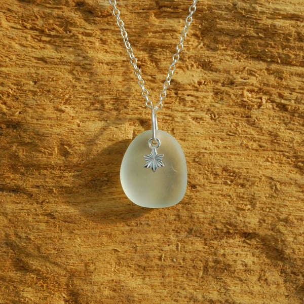 Beach glass pendant with tiny star