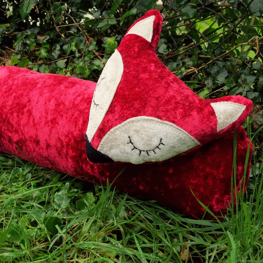 Red fox.  A fox draught excluder made from crushed velvet. 40 inches in length. 