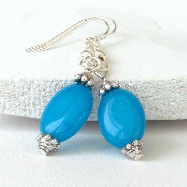 Oval blue jade earrings