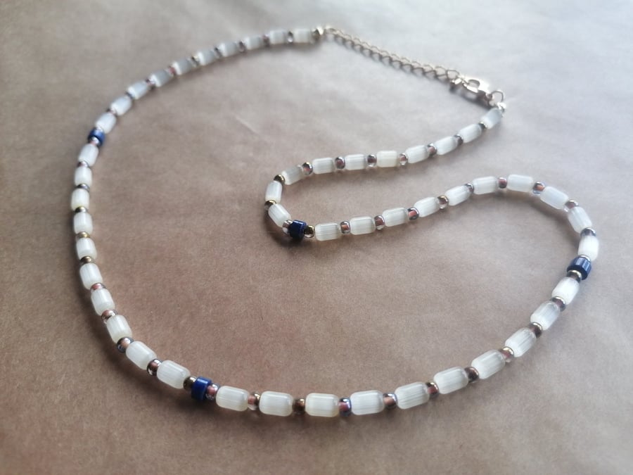 Lemon, Lapis Lazuli necklace. Light gold chain. 