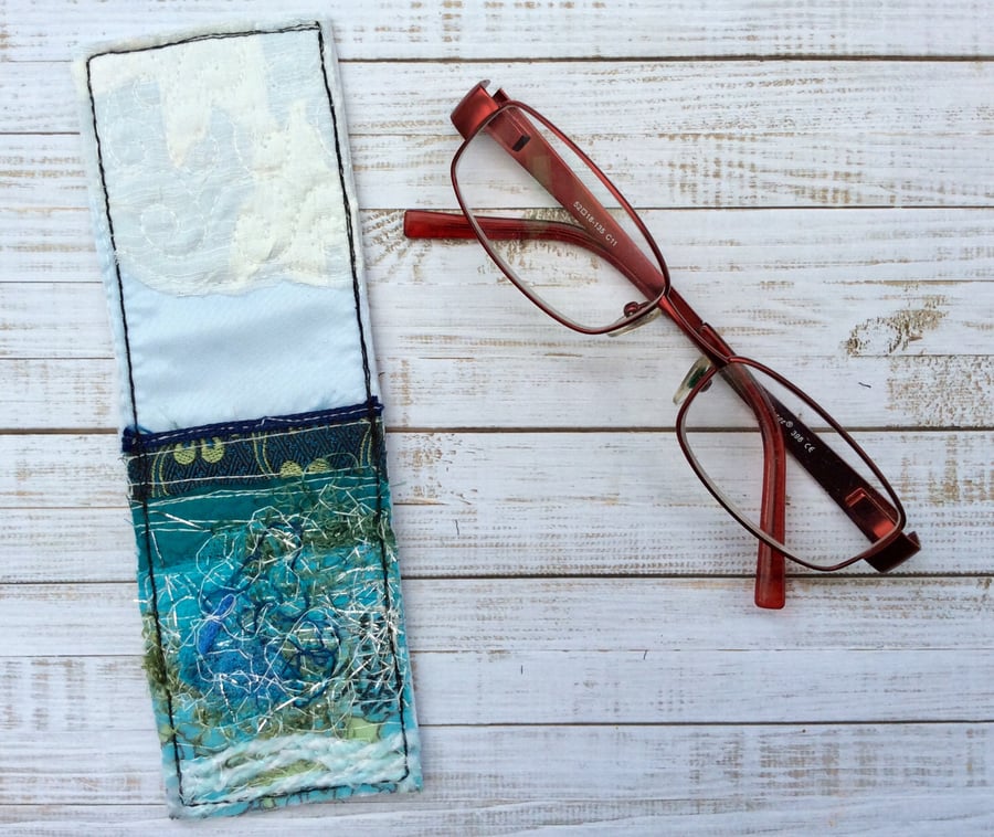 Embroidered upcycled seascape bookmark.