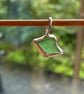 Beautiful green seaglass in silver charm pendant