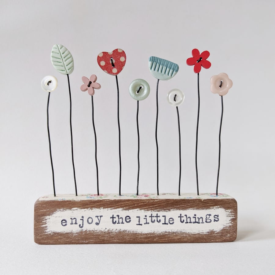 Button and Clay Flower Garden in a Floral Block 'Enjoy the little things'